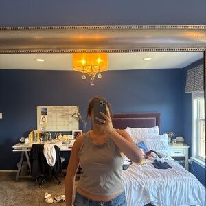 Free people movement beige tank size large but fits like a medium!